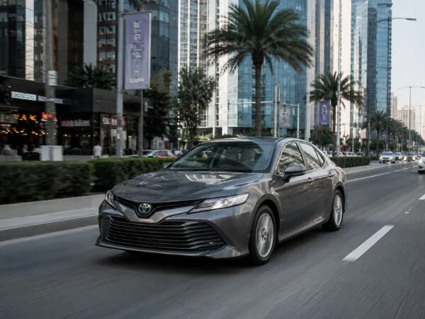 Sedan driving on a city street
